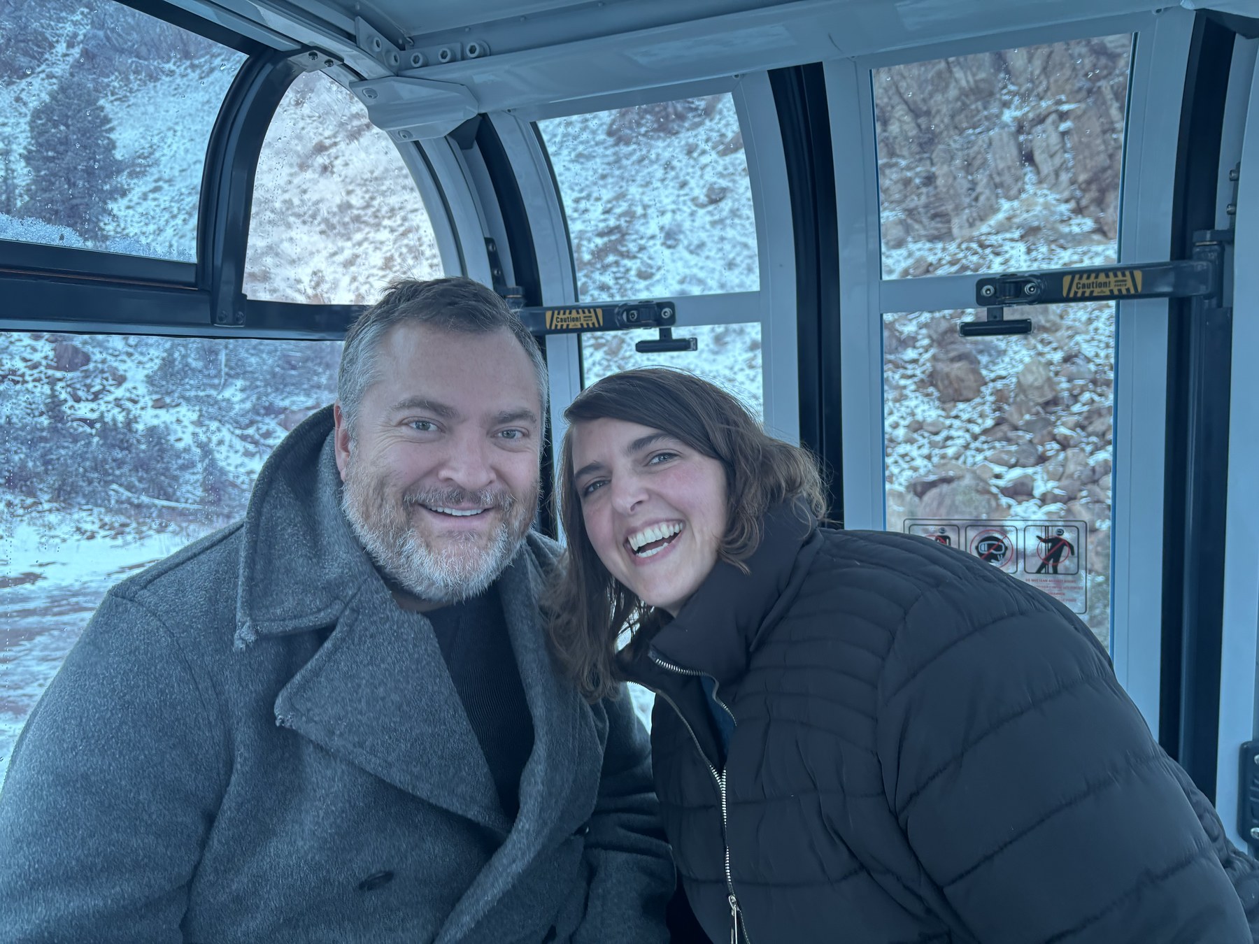 Jeff and Janica DeJuncker smiling together during a family trip.